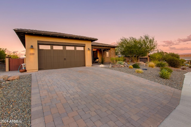 view of front of property with a garage