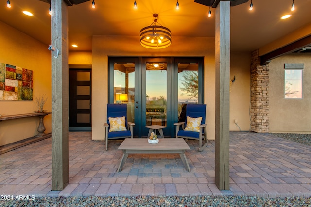 view of patio terrace at dusk