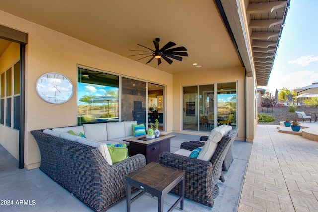 view of patio / terrace with ceiling fan and an outdoor hangout area