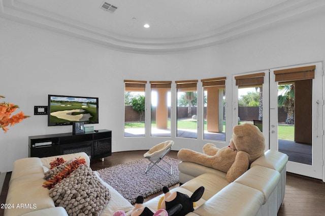 living room with french doors and hardwood / wood-style floors