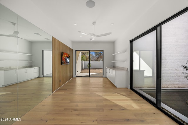 hallway featuring light hardwood / wood-style flooring