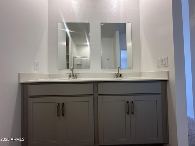 46922 W Coe St, Maricopa, AZ 85139 - bathroom with double vanity and a shower with door