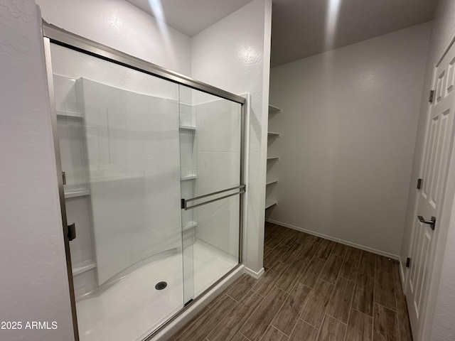 46922 W Coe St, Maricopa, AZ 85139 - full bath featuring wood tiled floors and a shower stall