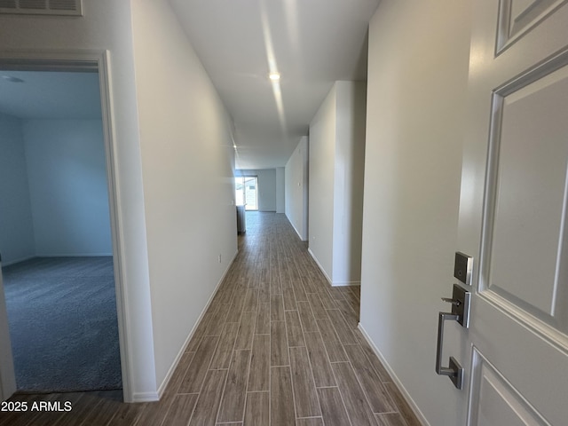 46922 W Coe St, Maricopa, AZ 85139 - hallway featuring baseboards and dark wood-style floors