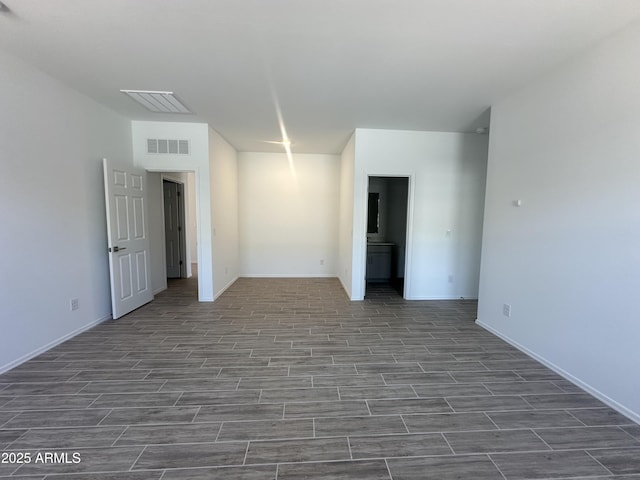 46922 W Coe St, Maricopa, AZ 85139 - spare room with wood finished floors and baseboards