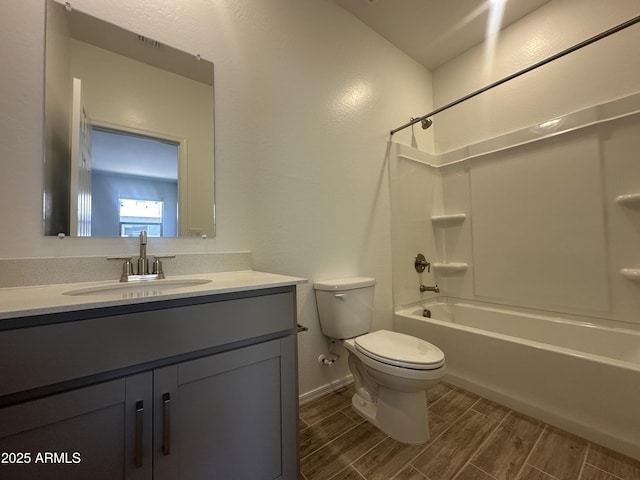 46922 W Coe St, Maricopa, AZ 85139 - full bath with toilet, wood finish floors, baseboards, vanity, and tub / shower combination