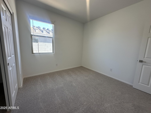 46922 W Coe St, Maricopa, AZ 85139 - unfurnished bedroom featuring carpet flooring, a closet, and baseboards