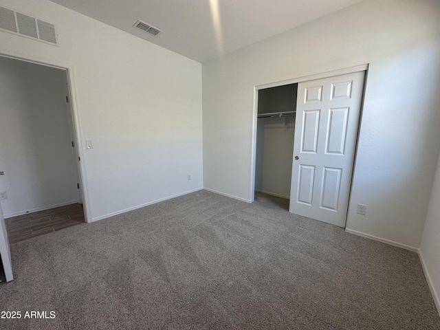 46922 W Coe St, Maricopa, AZ 85139 - unfurnished bedroom featuring carpet, a closet, and baseboards