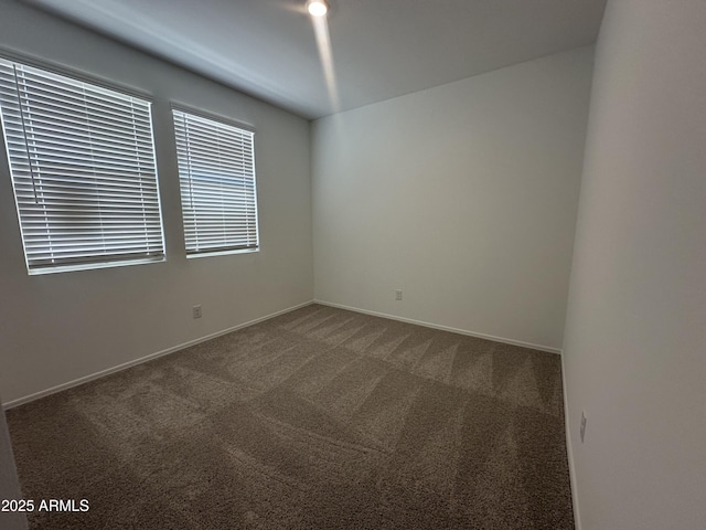 46922 W Coe St, Maricopa, AZ 85139 - spare room featuring carpet floors and baseboards