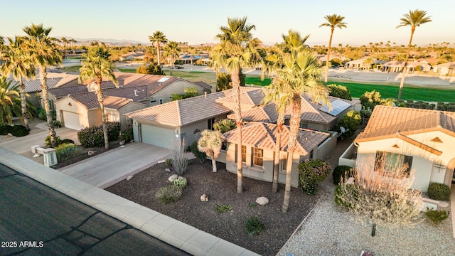 aerial view at dusk with a residential view