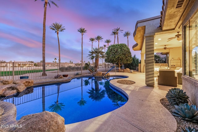 view of pool with a patio area, fence, and a fenced in pool