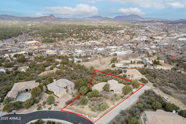 drone / aerial view with a residential view and a mountain view