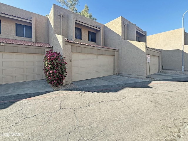 view of front of home with a garage