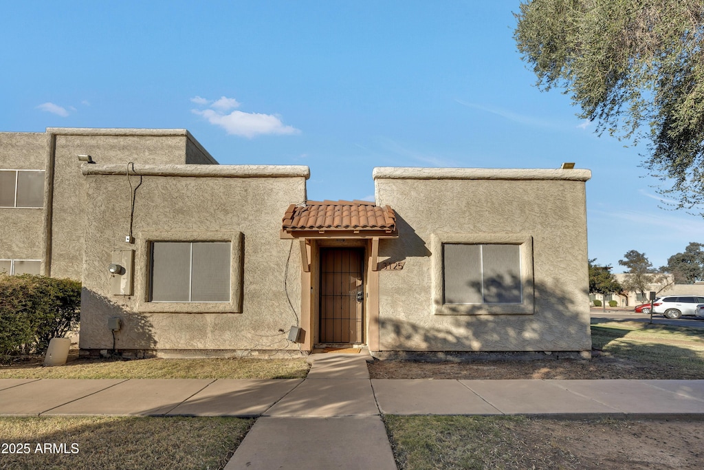 view of pueblo-style home