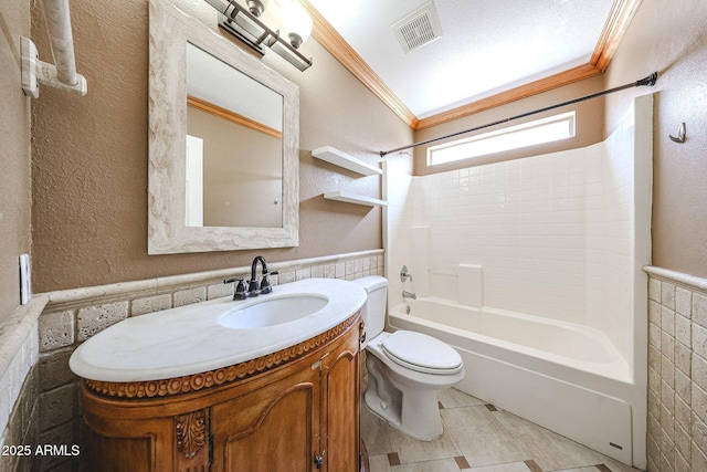 3033 E Millbrae Ln, Gilbert, AZ 85234 - full bath featuring tile walls, vanity, tub / shower combination, wainscoting, and crown molding