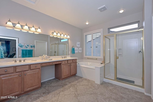 bathroom with vanity and independent shower and bath