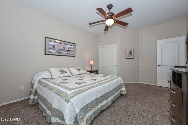 bedroom with a closet, ceiling fan, and dark colored carpet