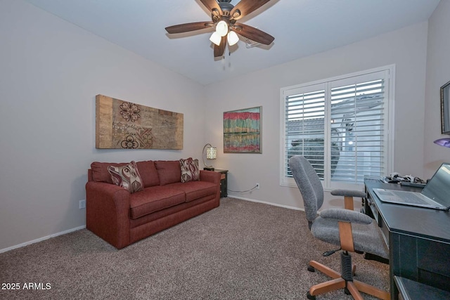 home office featuring ceiling fan and carpet