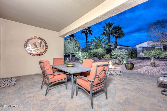 view of patio terrace at dusk