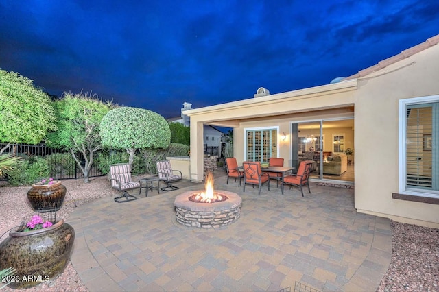 view of patio / terrace with an outdoor fire pit