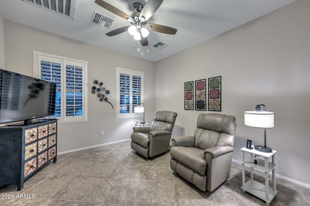 sitting room with ceiling fan