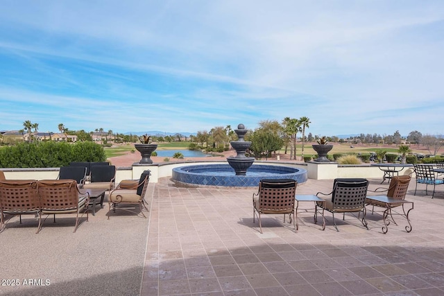 view of patio / terrace featuring a water view