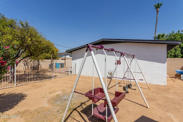 exterior space featuring a playground