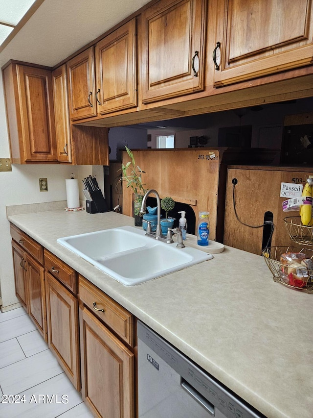 kitchen with dishwasher and sink