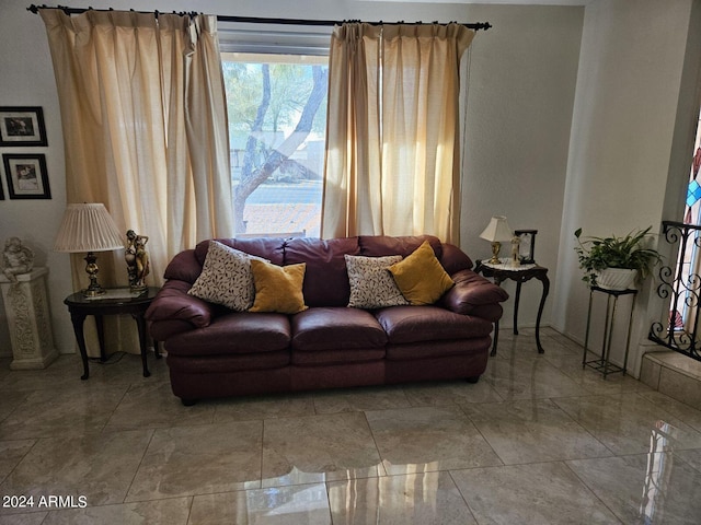 living room featuring a wealth of natural light