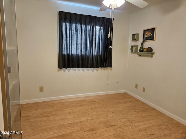 unfurnished room featuring light hardwood / wood-style floors and ceiling fan