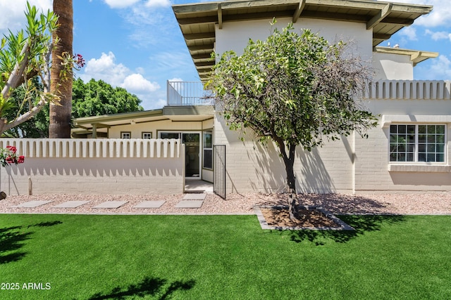 6001 N 10th Way, Phoenix, AZ 85014 - rear view of property featuring brick siding