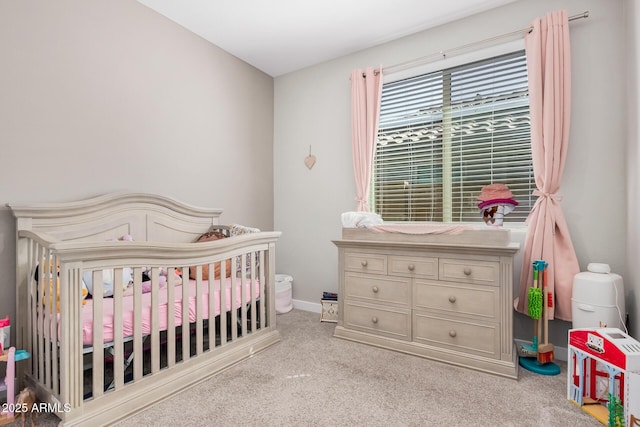 16573 W Alameda Rd, Surprise, AZ 85387 - carpeted bedroom with a crib and baseboards