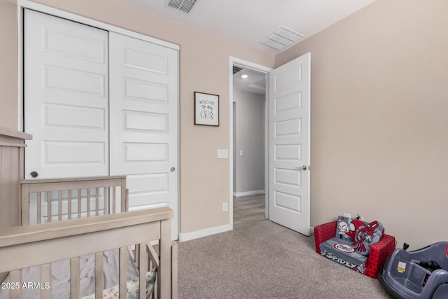 16573 W Alameda Rd, Surprise, AZ 85387 - bedroom with carpet flooring, baseboards, visible vents, and a closet