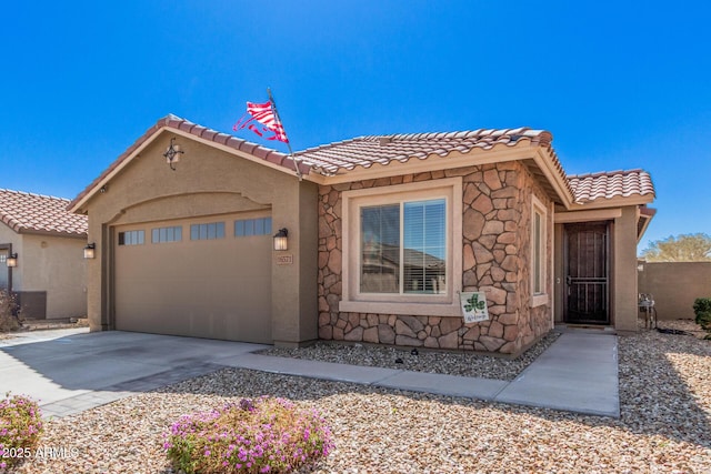 16573 W Alameda Rd, Surprise, AZ 85387 - mediterranean / spanish-style house with a tile roof, stucco siding, concrete driveway, and a garage
