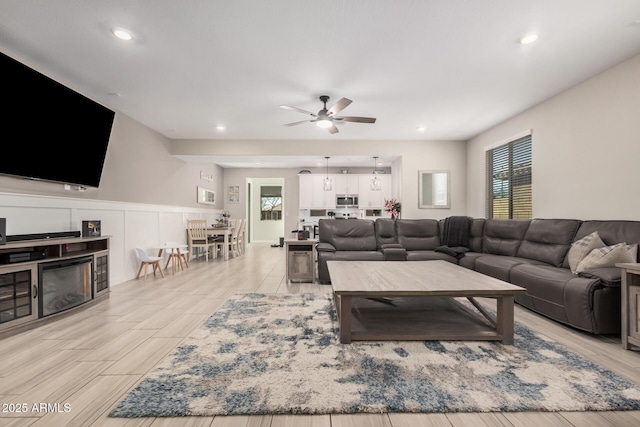 16573 W Alameda Rd, Surprise, AZ 85387 - living room with recessed lighting, a ceiling fan, and wainscoting
