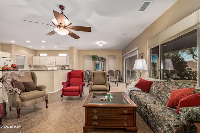 living room with ceiling fan