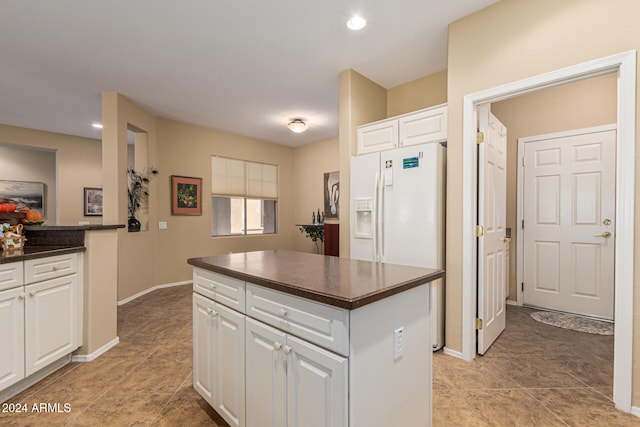 kitchen featuring white cabinets and a kitchen island