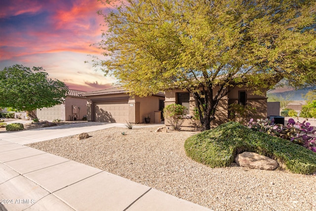 view of front of home featuring a garage