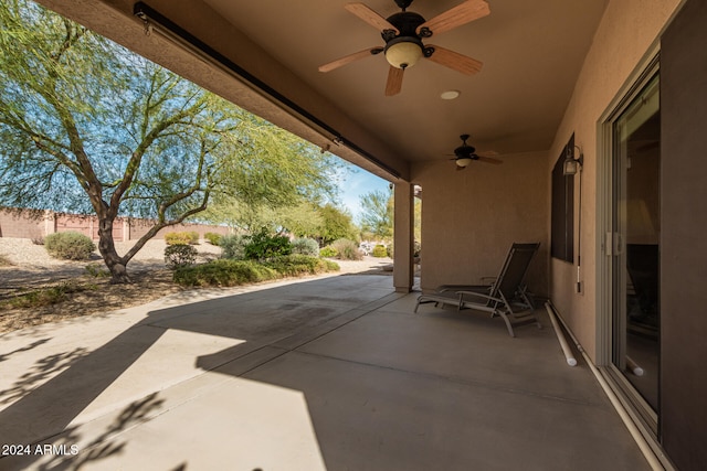 view of patio featuring ceiling fan