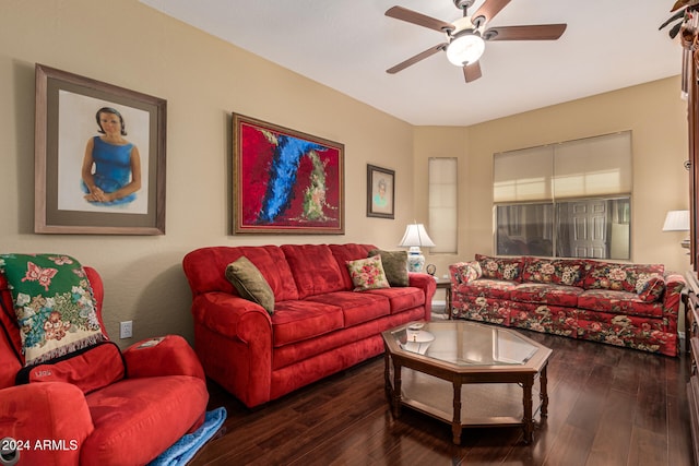 living room with dark hardwood / wood-style floors and ceiling fan