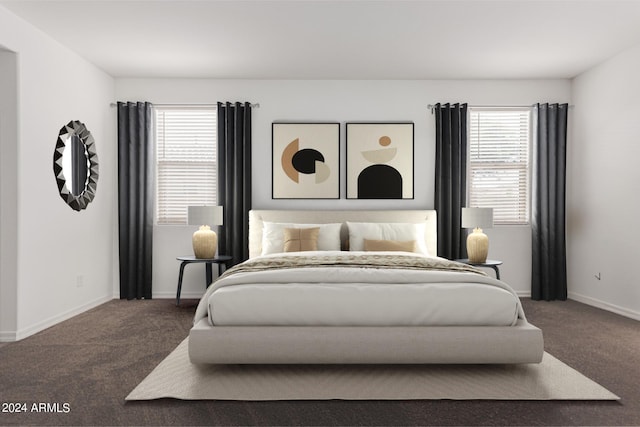 bedroom featuring dark colored carpet