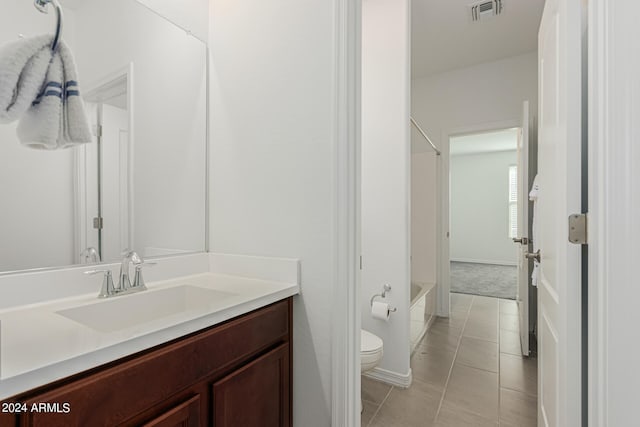 full bathroom with vanity, toilet, shower / bath combination, and tile patterned floors