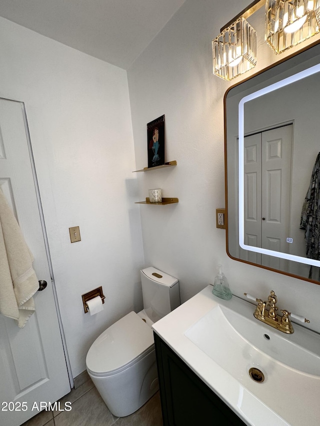 1222 E Almeria Rd, Phoenix, AZ 85006 - bathroom with toilet, vanity, and tile patterned flooring