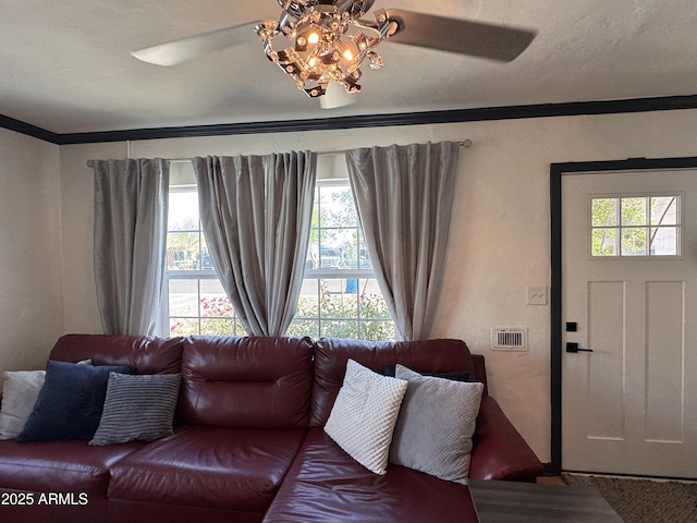 1222 E Almeria Rd, Phoenix, AZ 85006 - living room featuring ceiling fan, crown molding, and carpet flooring