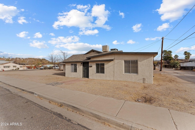 view of front of property with central AC