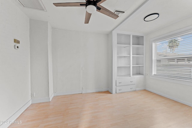 unfurnished room featuring ceiling fan and light hardwood / wood-style flooring