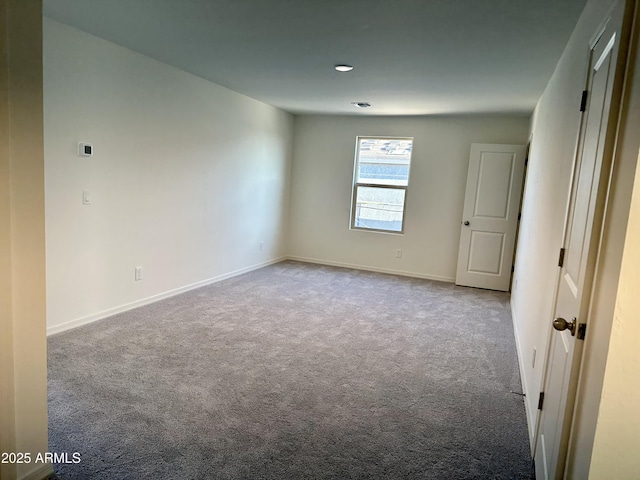 view of carpeted spare room