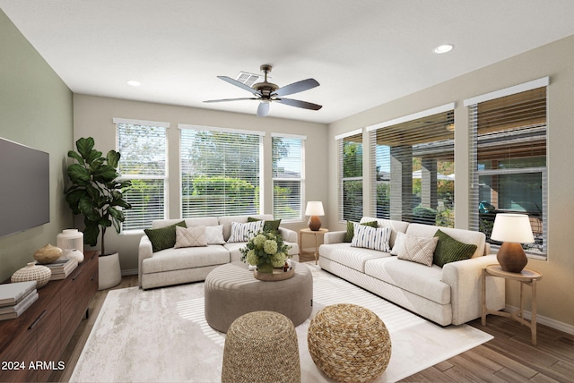 731 E Verde Blvd, Queen Creek, AZ 85140 - living room with plenty of natural light, wood finished floors, ceiling fan, baseboards, and recessed lighting