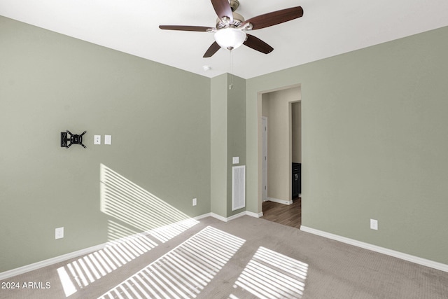 731 E Verde Blvd, Queen Creek, AZ 85140 - carpeted empty room with a ceiling fan and baseboards