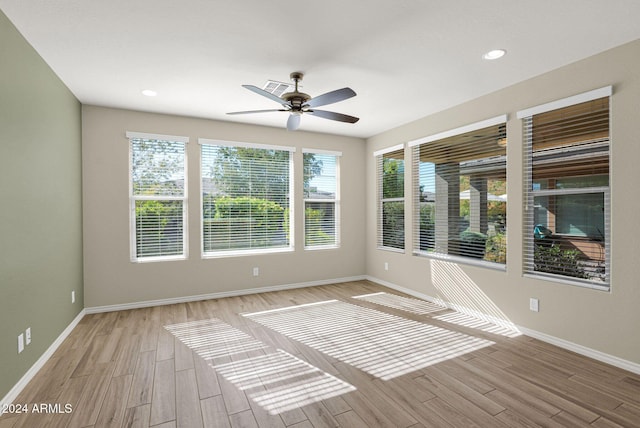 731 E Verde Blvd, Queen Creek, AZ 85140 - unfurnished room with ceiling fan, light wood-style floors, baseboards, and recessed lighting